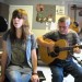 Image of Father and daughter do awesome Beatles "Revolution" cover. Parent-child bonding, done so right.